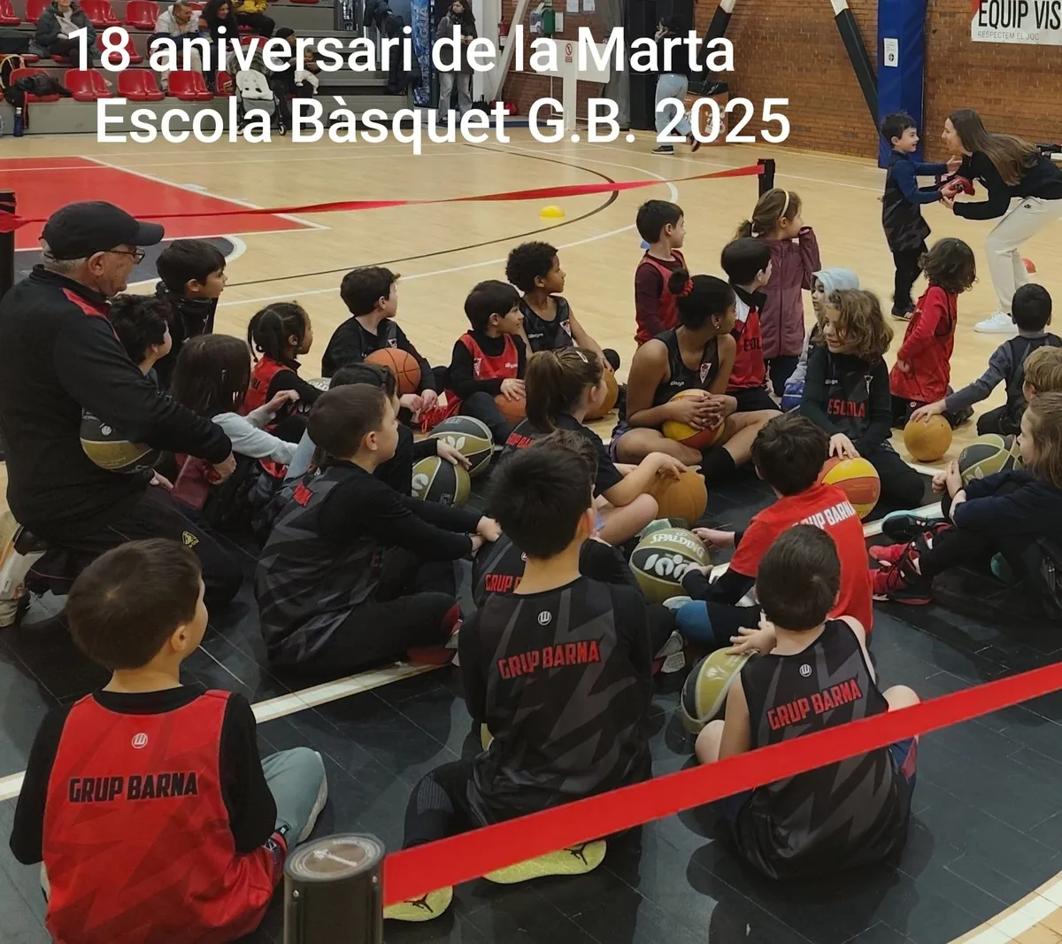 The Escoleta's children sitting on the court listening
