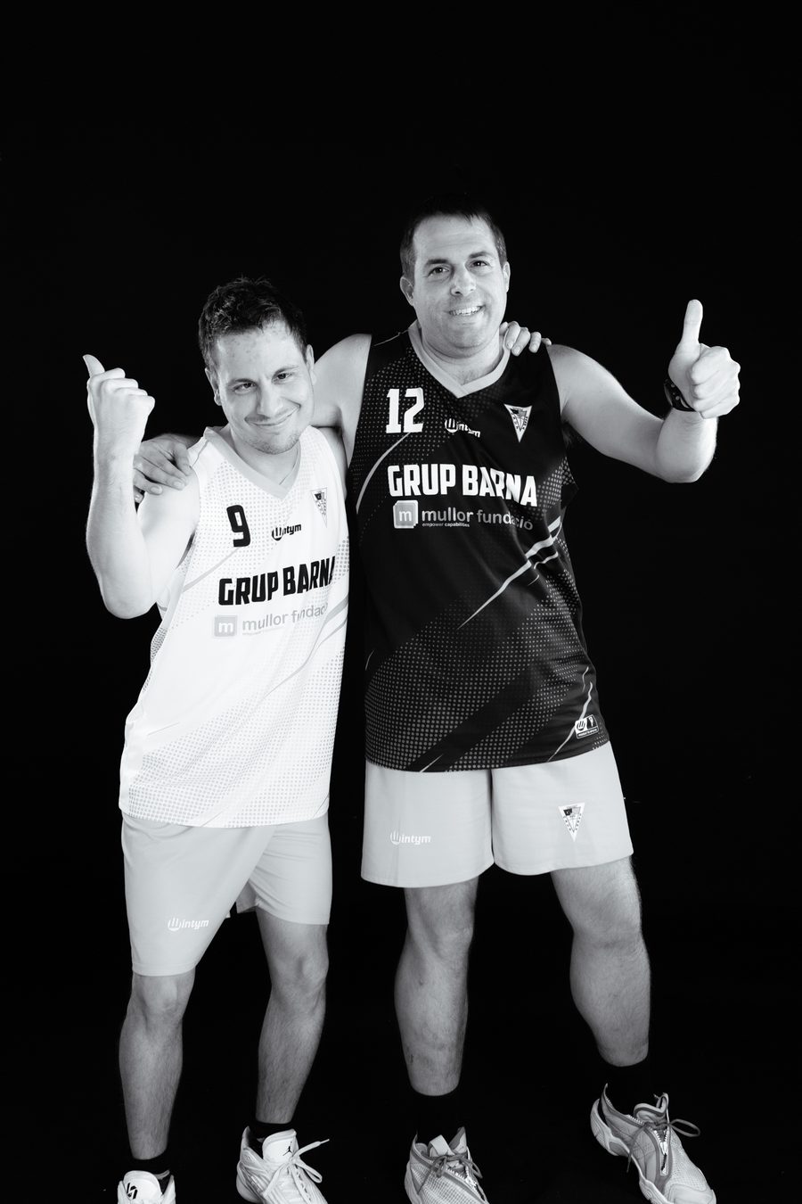 Two Barna Màgics players celebrating together